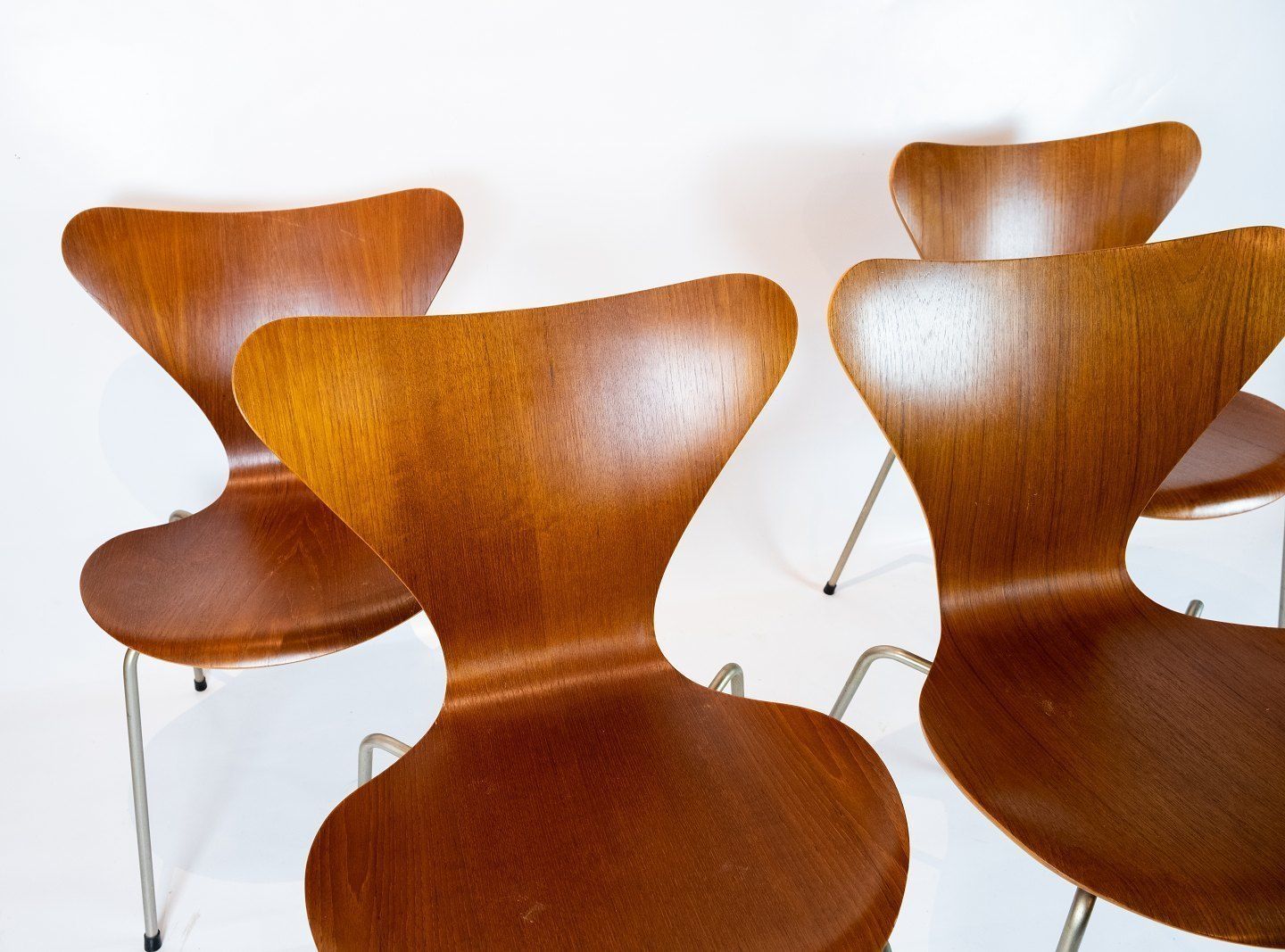 Set Of Four Seven Chairs, Model 3107, In Teak Designed By Arne Jacobsen And Manufactured By Fritz Hansen. photo furniture