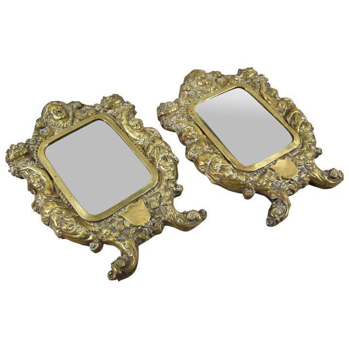 A Pair Of 19th Century French Brass Framed Wall Hanging Mirrors photo furniture