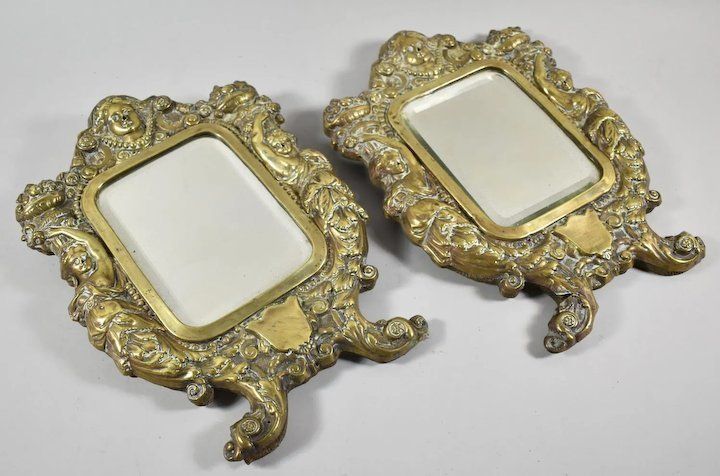 A Pair Of 19th Century French Brass Framed Wall Hanging Mirrors