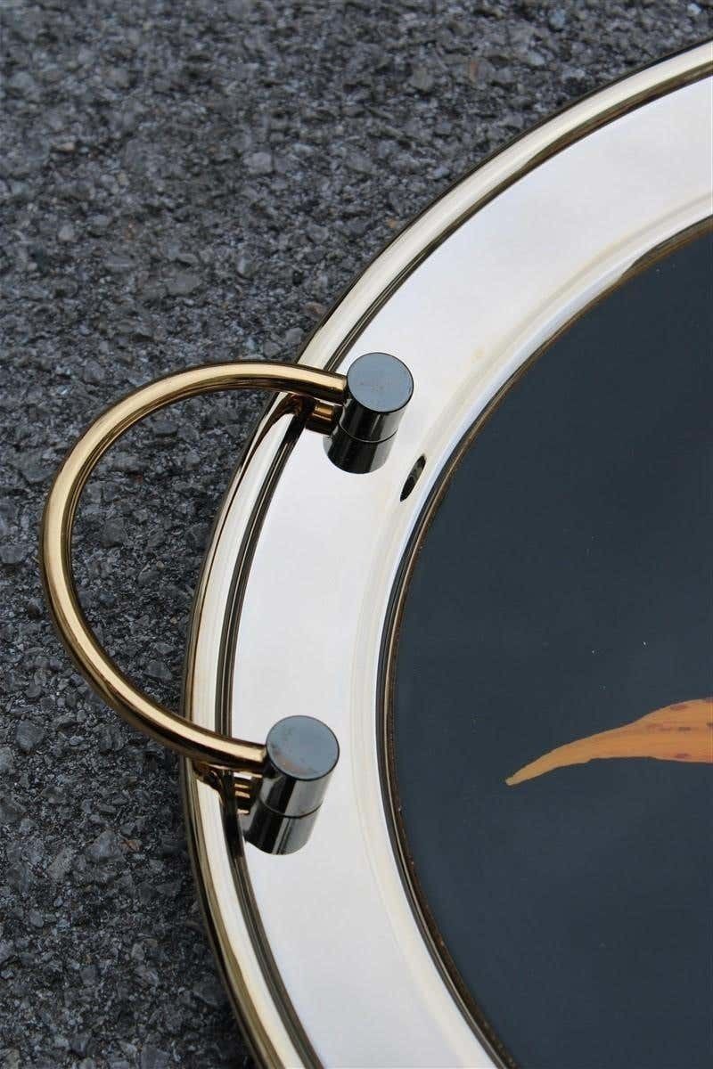 Round Tray In Golden Brass With Black Background And Real Leaves Made In Italy photo vintage