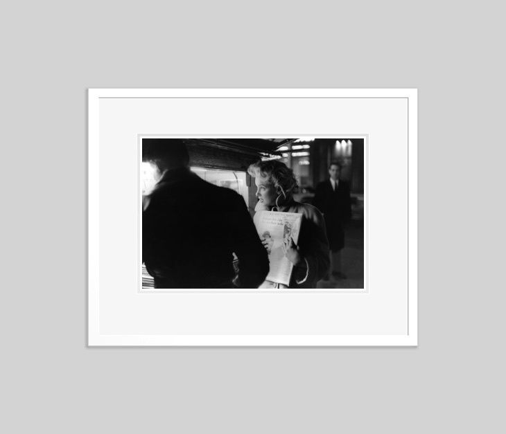 'Marilyn Gets The Paper' Marilyn Monroe 1955 Silver Gelatin Print Framed In White