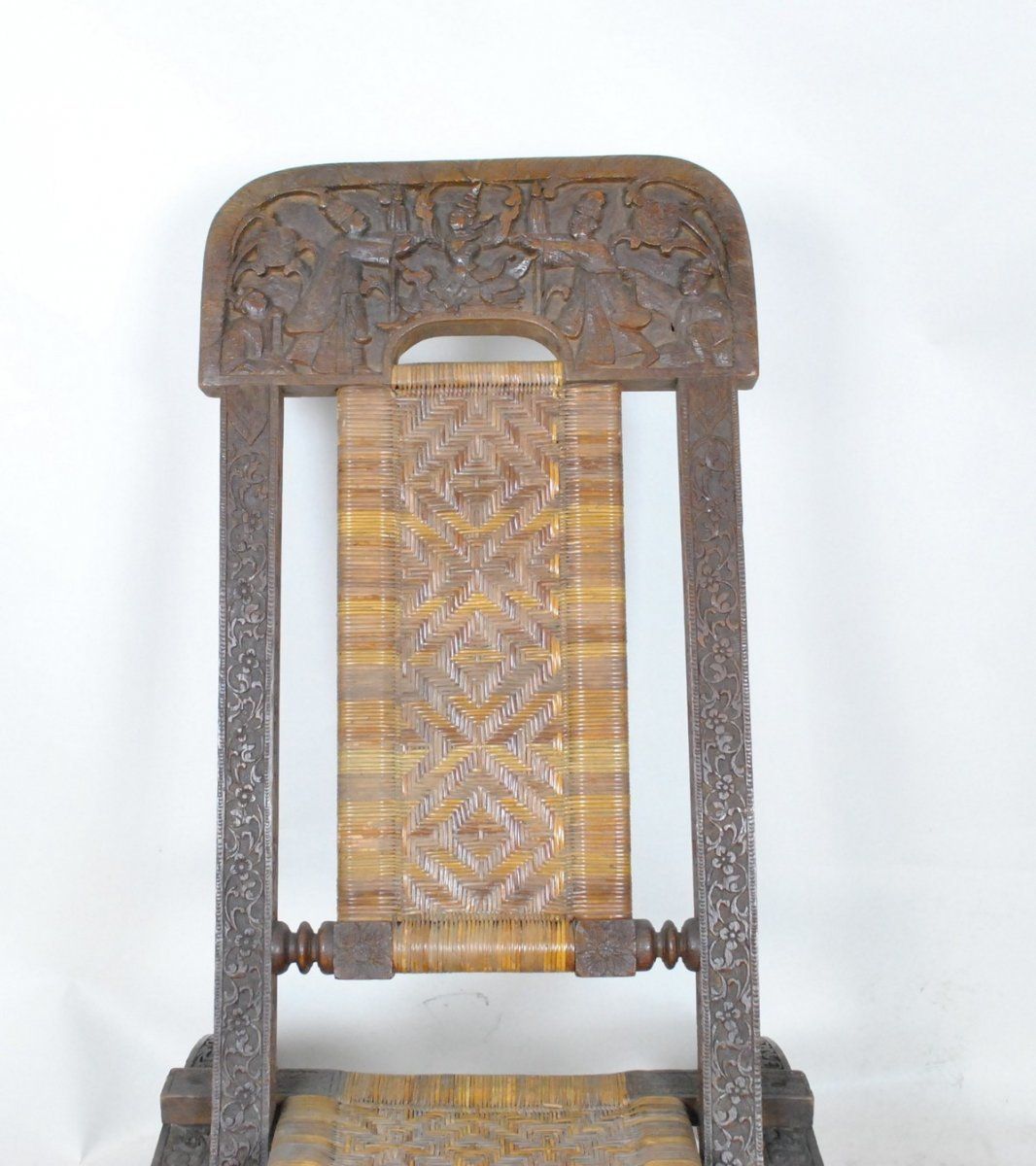 photo furniture Folding Chair In Carved Exotic Wood And Cannage, Asia, Late 19th / Early 20th Century