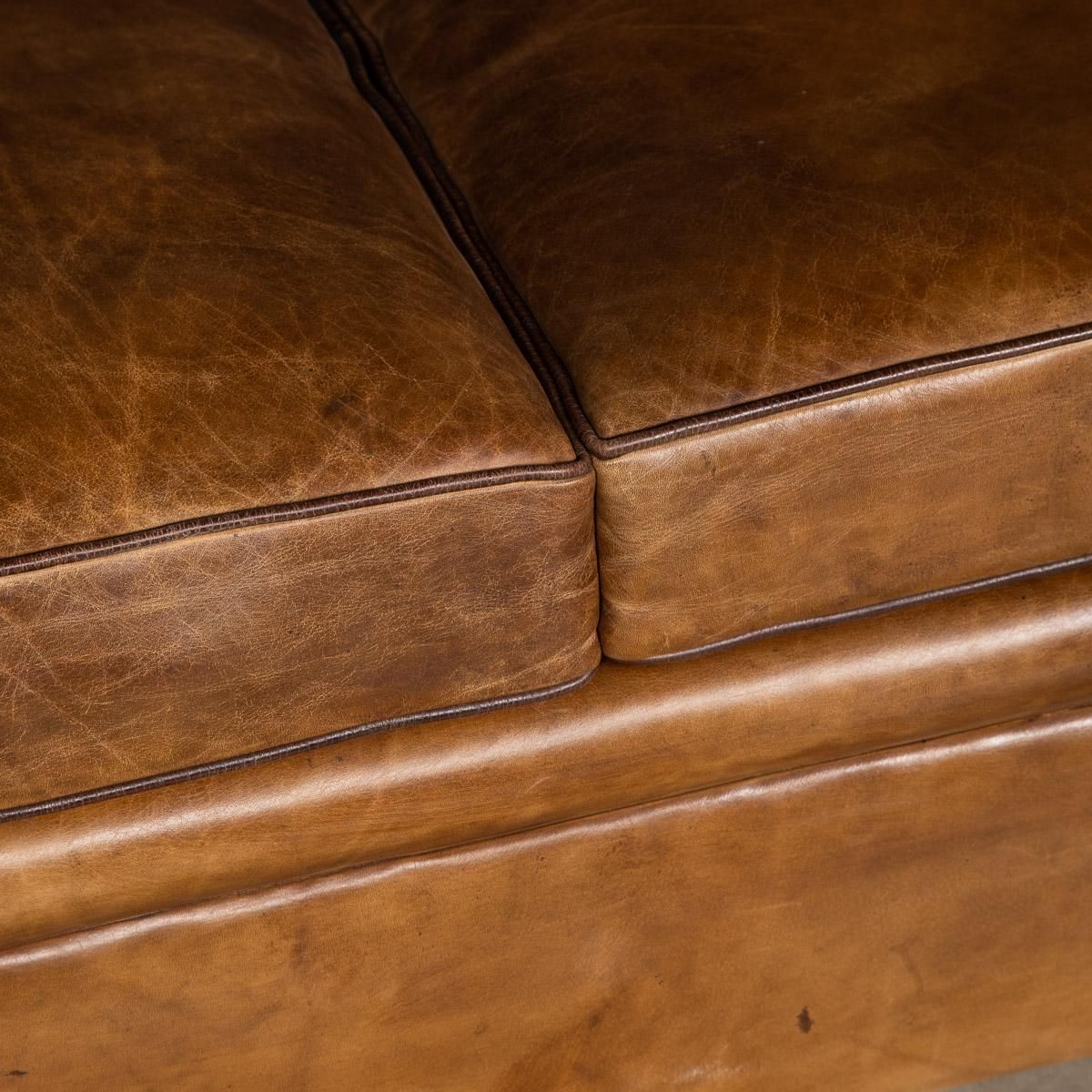 7595.0 20th Century Art Deco Pair Of Leather Tub Chairs And Sofa, Circa 1920 photo