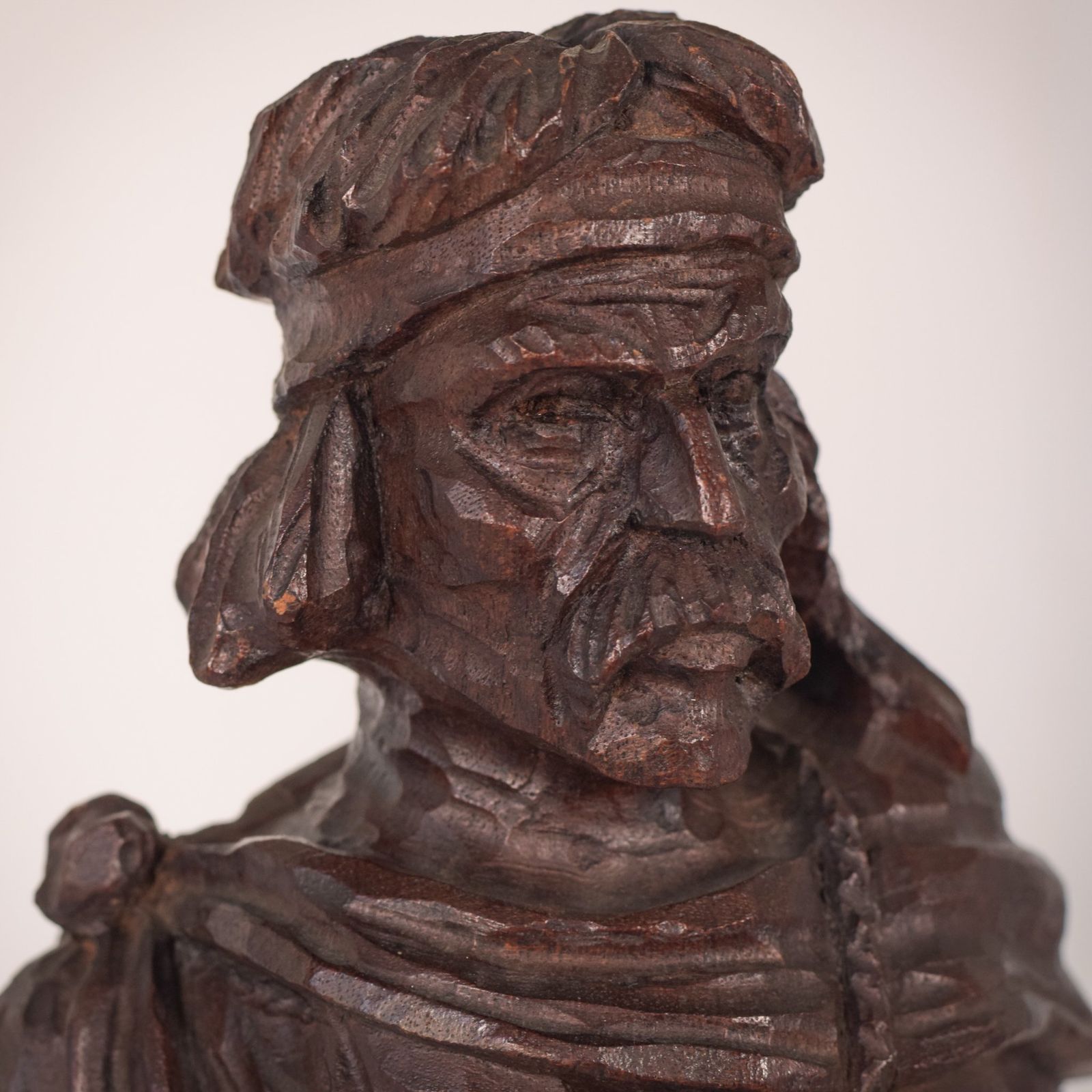 Hand Carved Wooden Sculpture Of A Male Figure photo 746.0