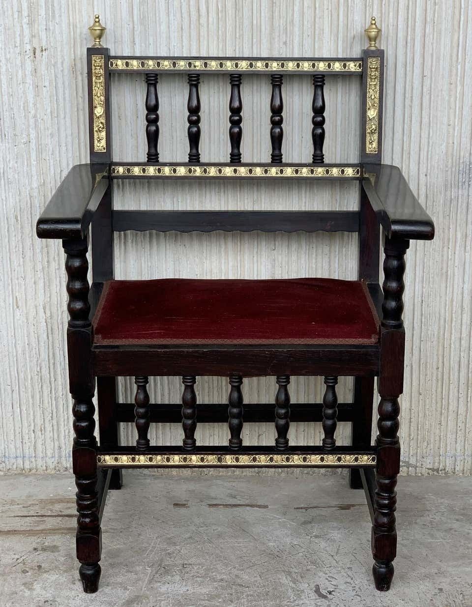 Pair Of Spanish Armchairs With Bronze Details And Red Velvet Upholstery photo furniture