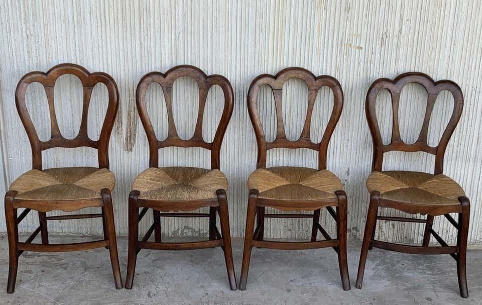 photo for sale Ensemble de cinq pièces : un banc et quatre chaises victoriennes, bois et rotin, XXe siècle