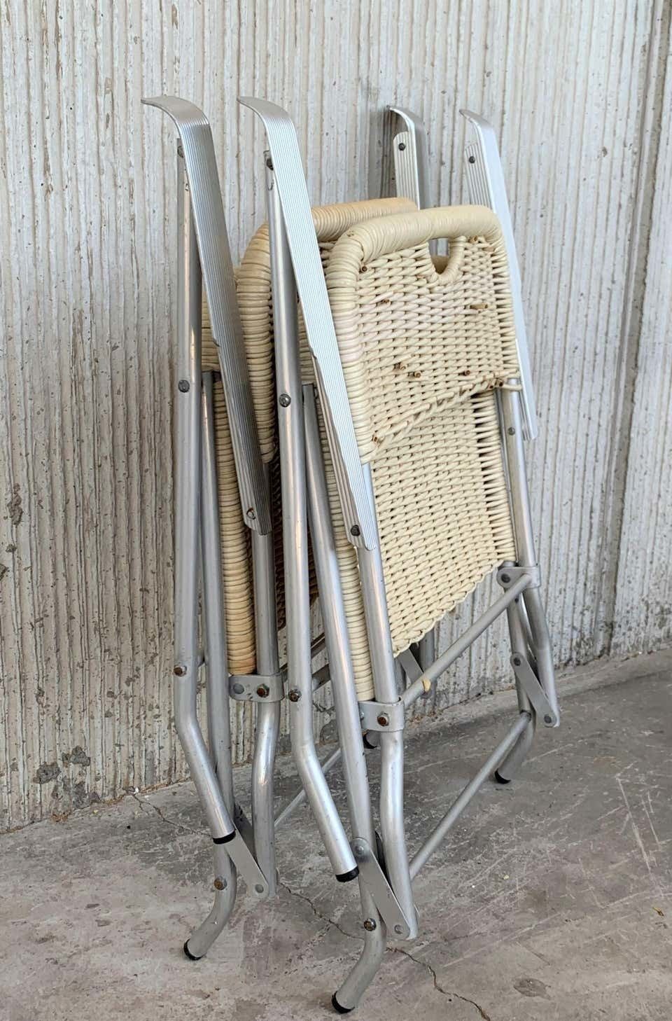 Paire de fauteuils pliants mid-century modern en rotin laqué et aluminium photo furniture