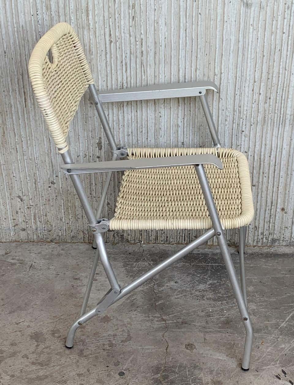 Paire de fauteuils pliants mid-century modern en rotin laqué et aluminium photo vintage
