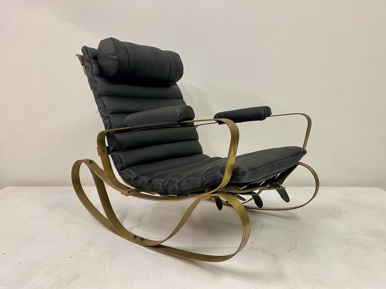 2695.0 1970s Italian Brass And Black Leather Rocking Chair By Luciano Frigerio photo