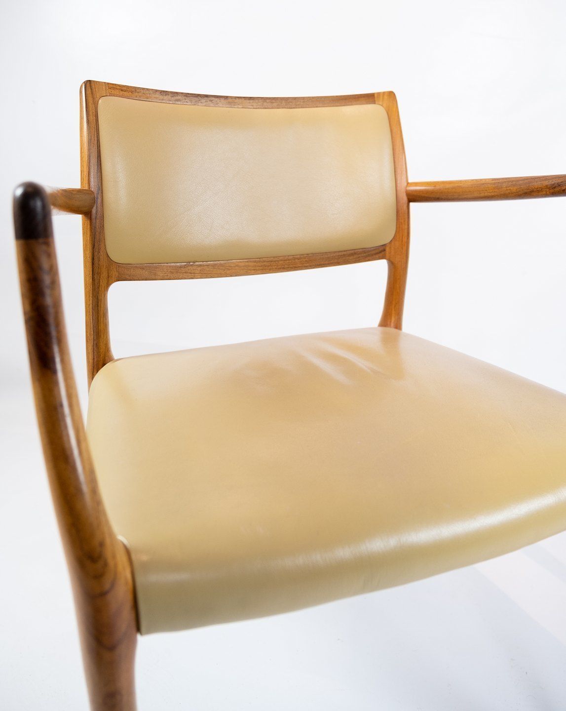 A Pair Of Armchairs, Model 65 Made In Rosewood  And Bright Leather By Niels O. Møller And J.L. Moller   1968 photo 4775.0