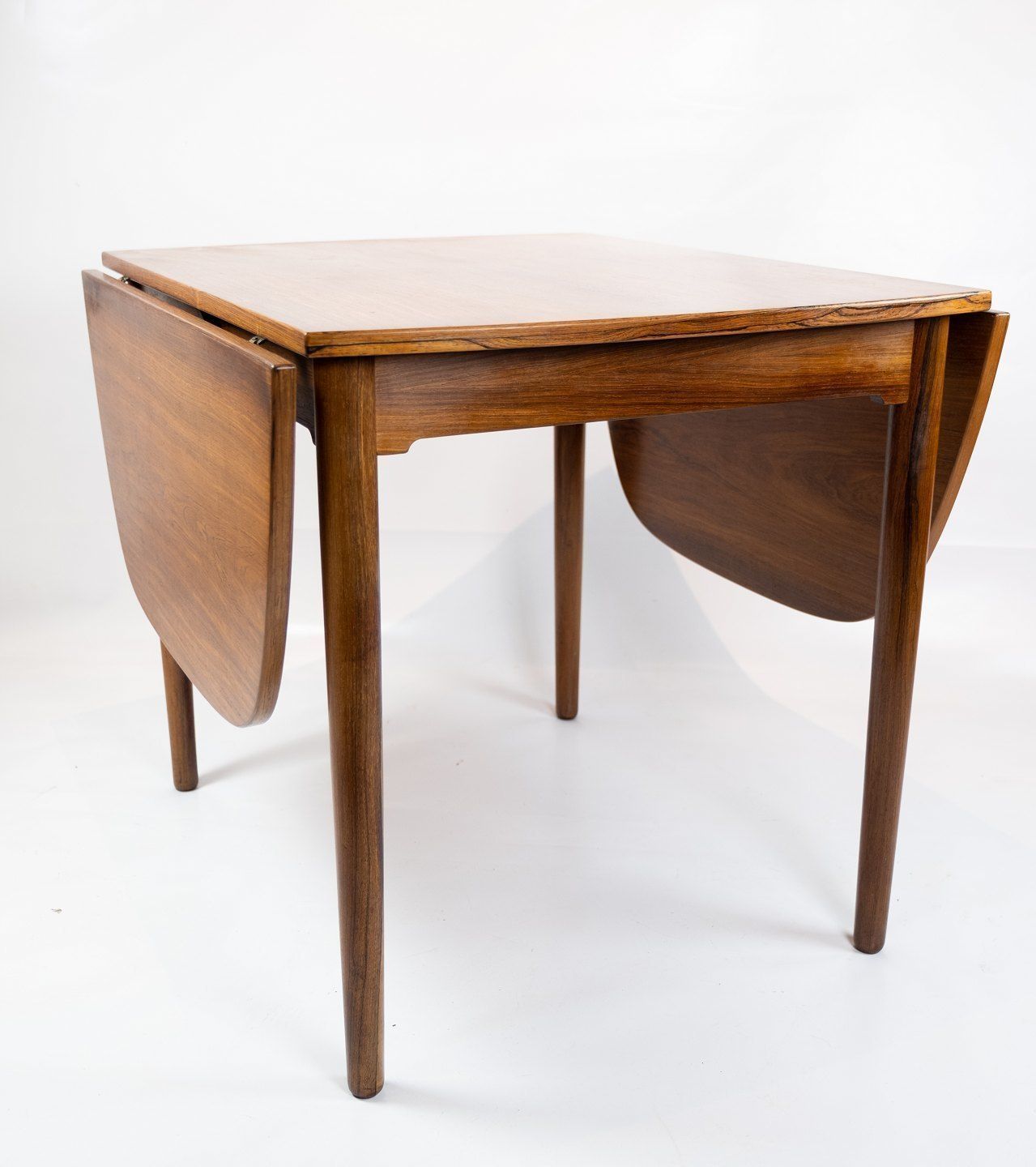 Small Dining Table In Rosewood With Extracts Of Danish Design From The 1960s. photo for sale