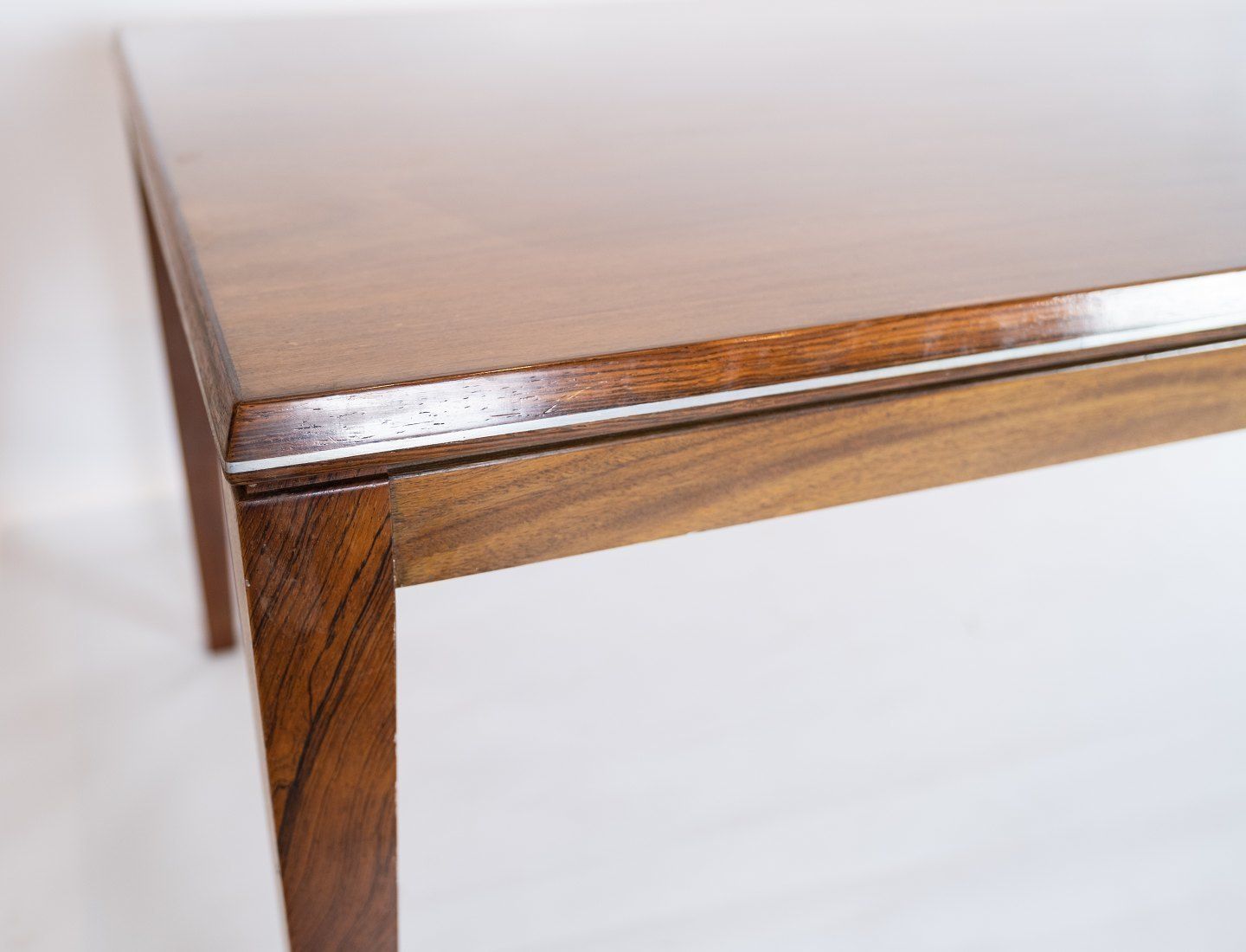 Coffee Table Made In Rosewood Decorated With Metal Edge Of Danish Design From The 1960s. photo buy