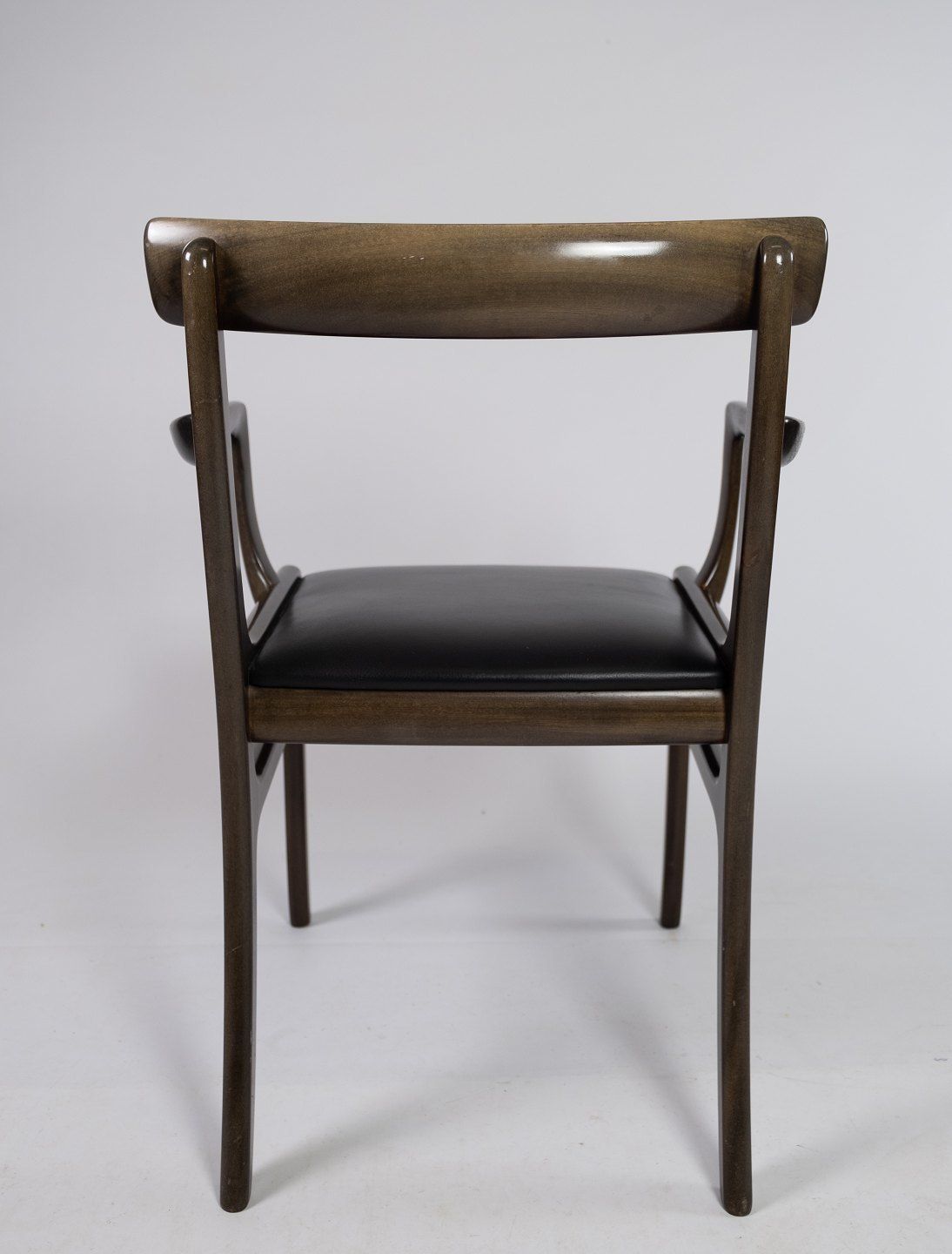A Pair Of Rungstedlund Armchairs In Mahogany And Uppolstered In Black Leather, By Ole Wanscher And P. Jeppesen. photo 2295.0