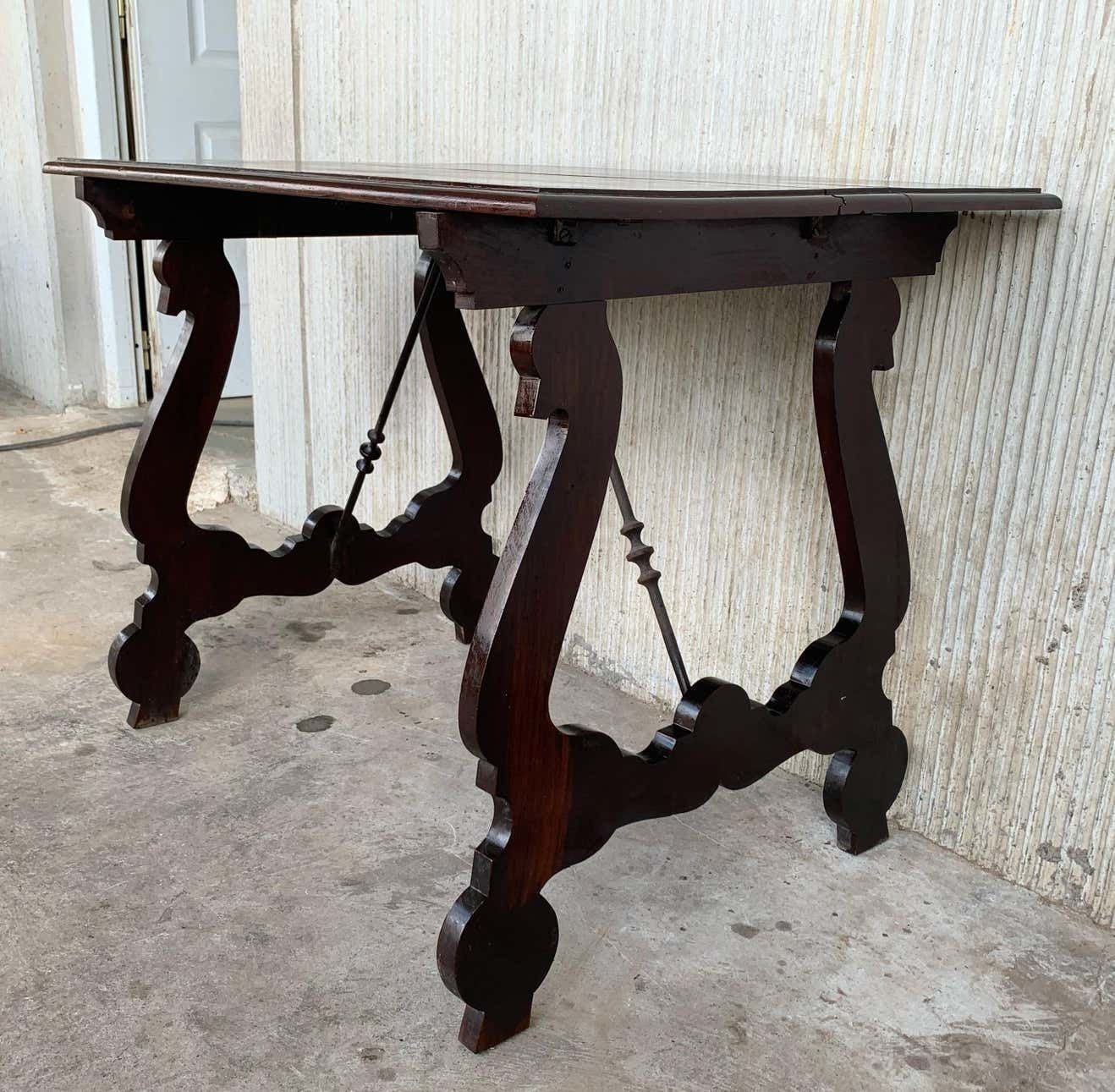 Table de réfectoire espagnole du XVIIIe siècle, pieds en lyre et entretoise en fer photo Mobilier