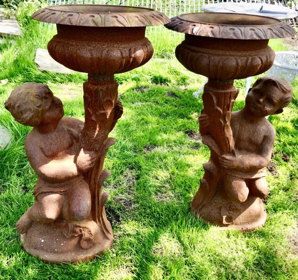 Pair Of Classical Iron Planters In The Form Of The Gemini Twins
