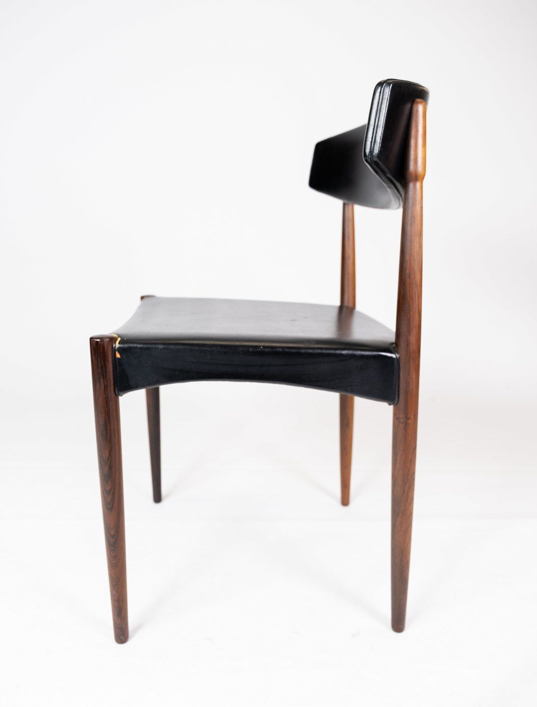 Set Of Four Dining Chairs In Rosewood And Black Leather Of Danish Design From The 1960s. photo 900.0
