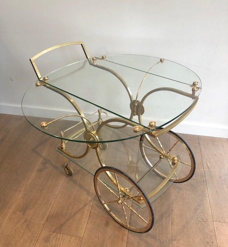 Maison Bagués. Rare Neoclassical Style Brass And Glass Drinks Trolley With Folding Rounded Glass Sides. French. Circa 1940 photo Furniture