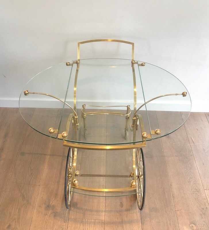 Maison Bagués. Rare Neoclassical Style Brass And Glass Drinks Trolley With Folding Rounded Glass Sides. French. Circa 1940 photo vinterior