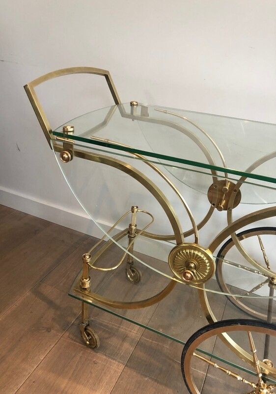Maison Bagués. Rare Neoclassical Style Brass And Glass Drinks Trolley With Folding Rounded Glass Sides. French. Circa 1940 photo vintage