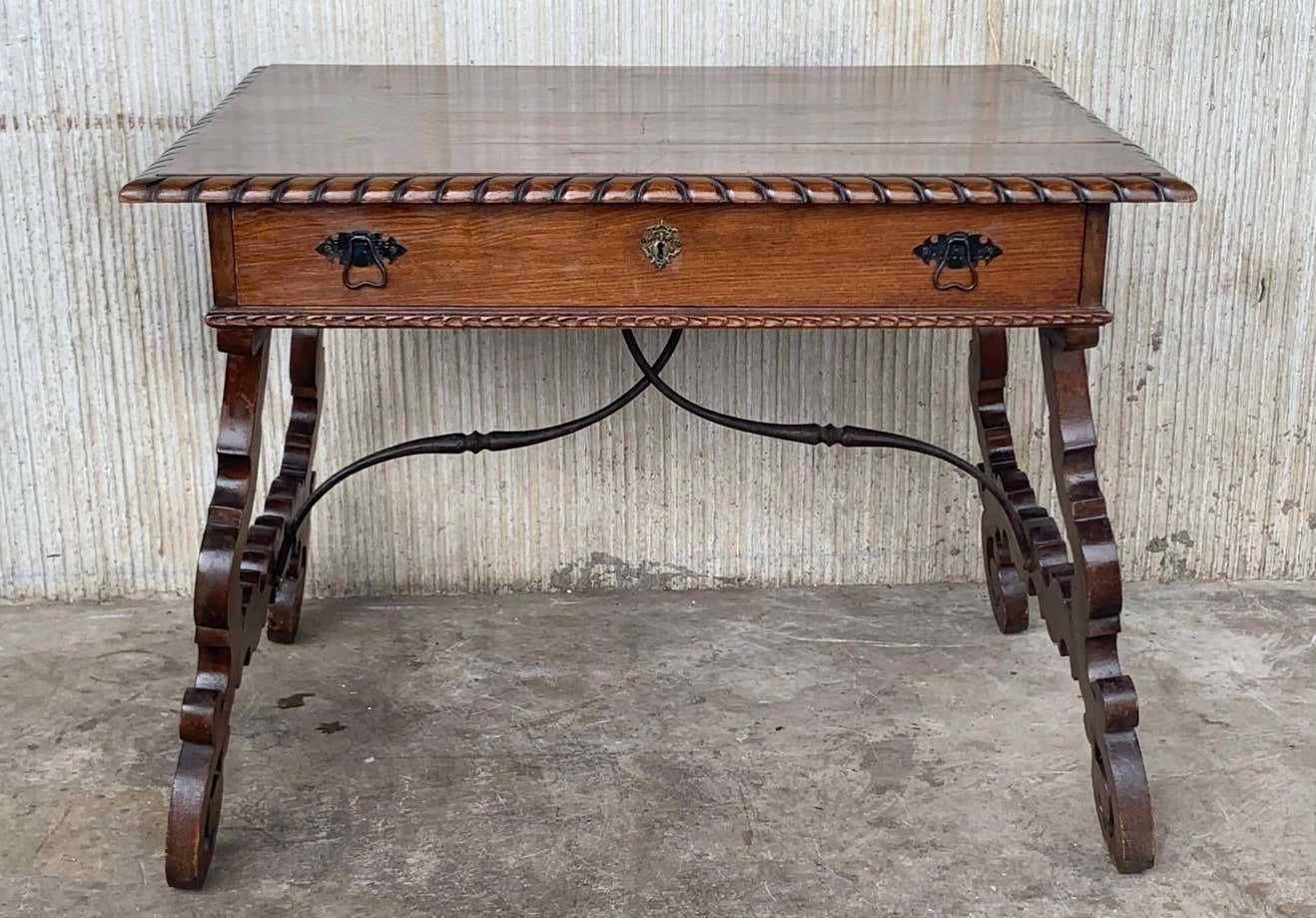 Early 20th Spanish Desk With Lyre Legs And Carved Edges On Top photo furniture