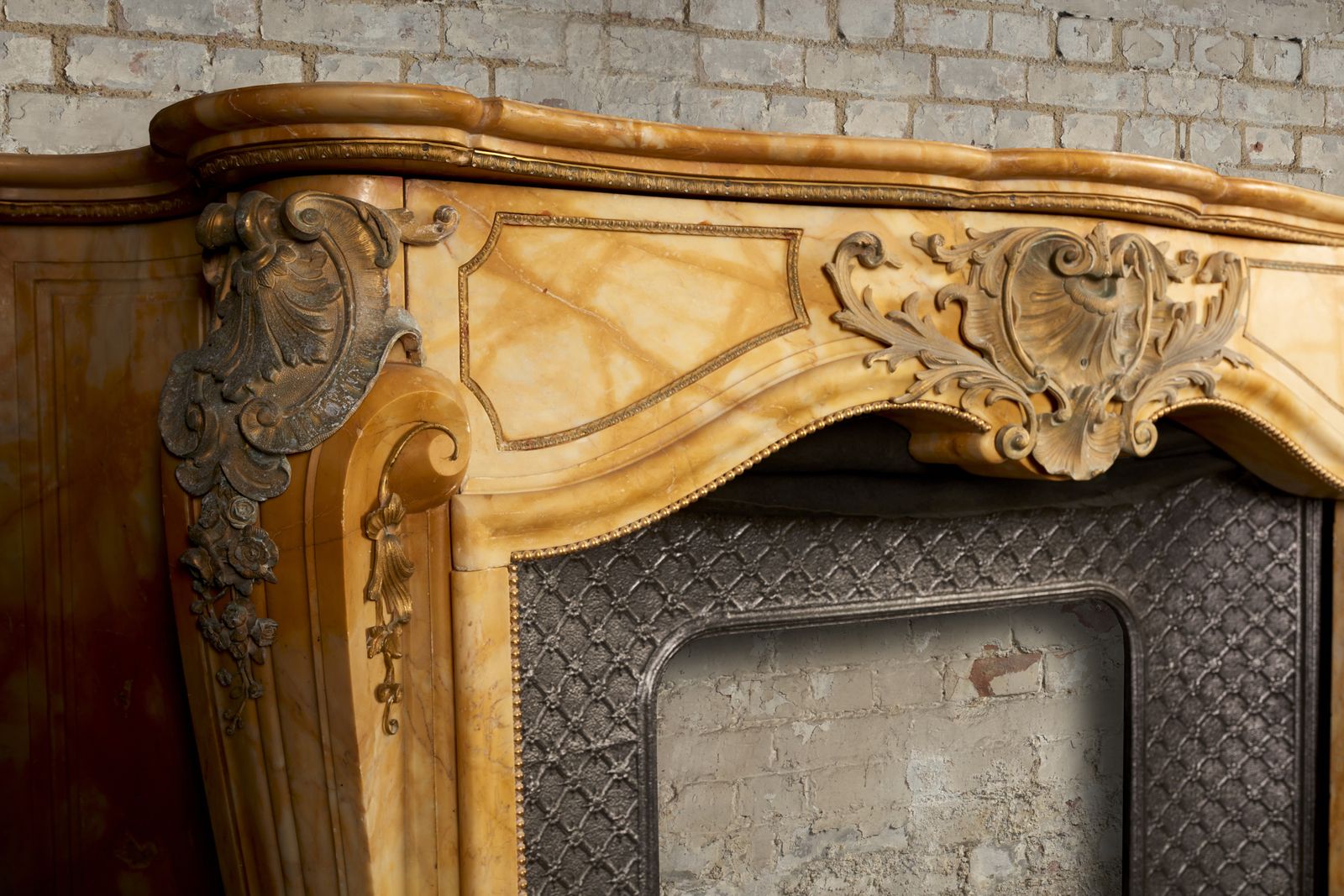 A Stunning French Sienna Marble Surround With Ormolu photo for sale