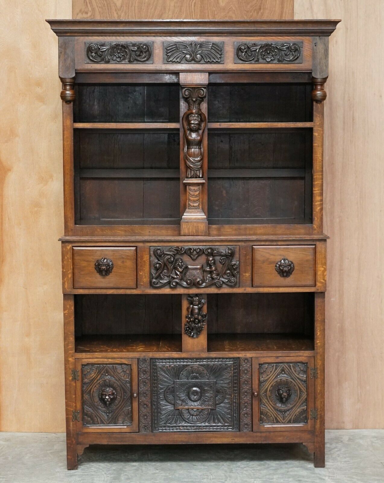 Large Heavily Carved Bookcase Cupboard With Ornate Cherub Putti & Lion Figures