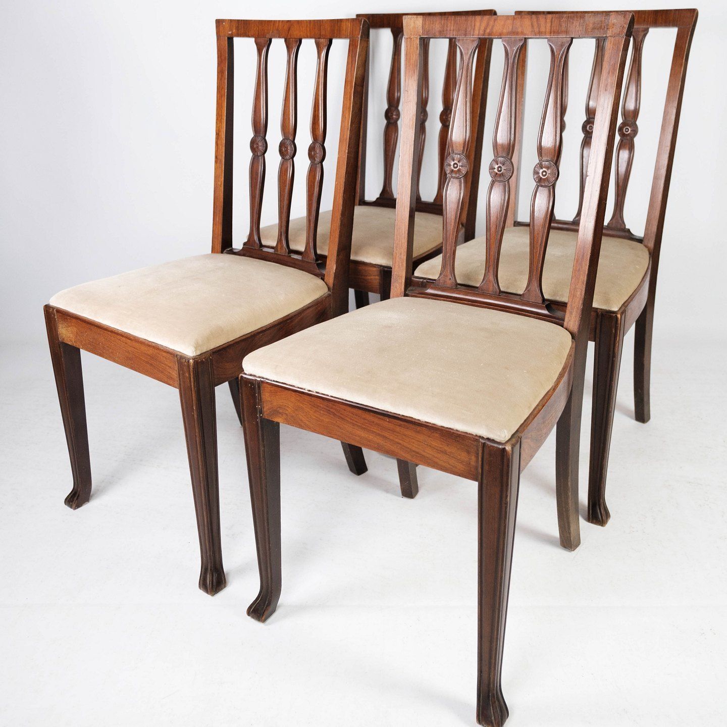 Set Of Four Dining Chairs Of Rosewood And Upholstered With Light Fabric From The 1920s. photo furniture
