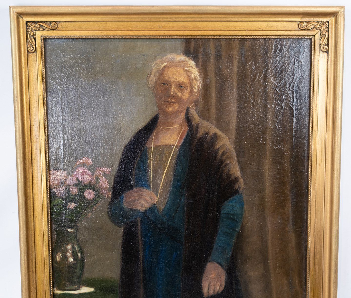 Oil Painting With  Portrait Motif And Golden Frame. photo furniture
