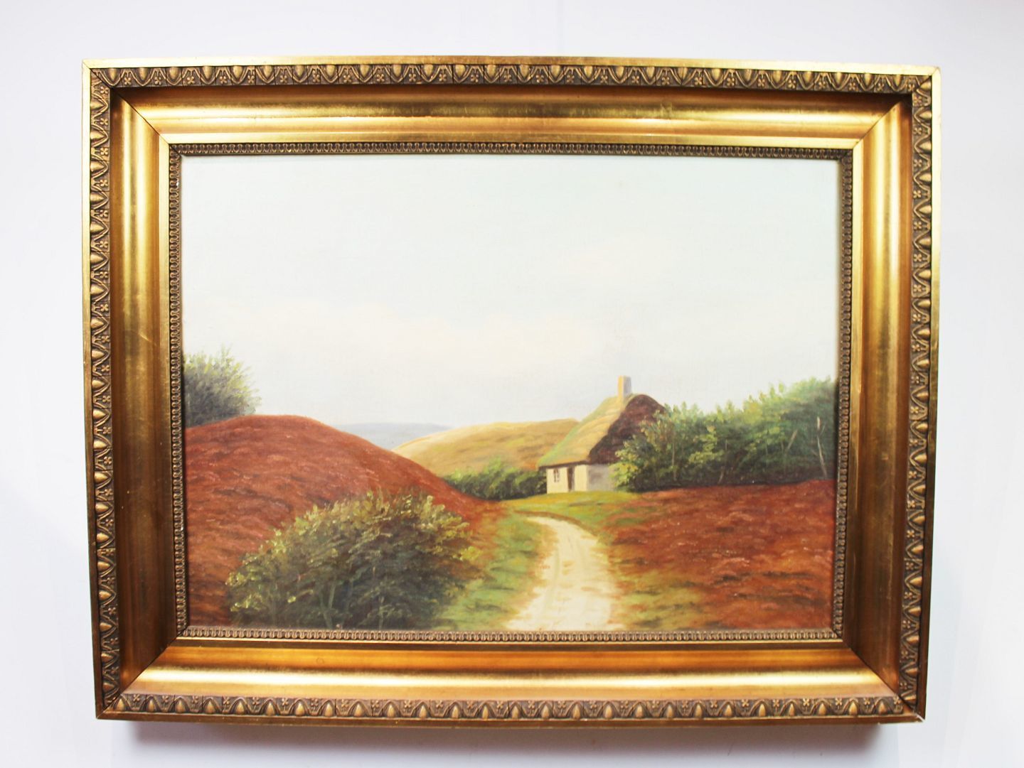 Oil Painting In Warm Colors With Motif Of Fields And Thatched House With Gilded Frame.