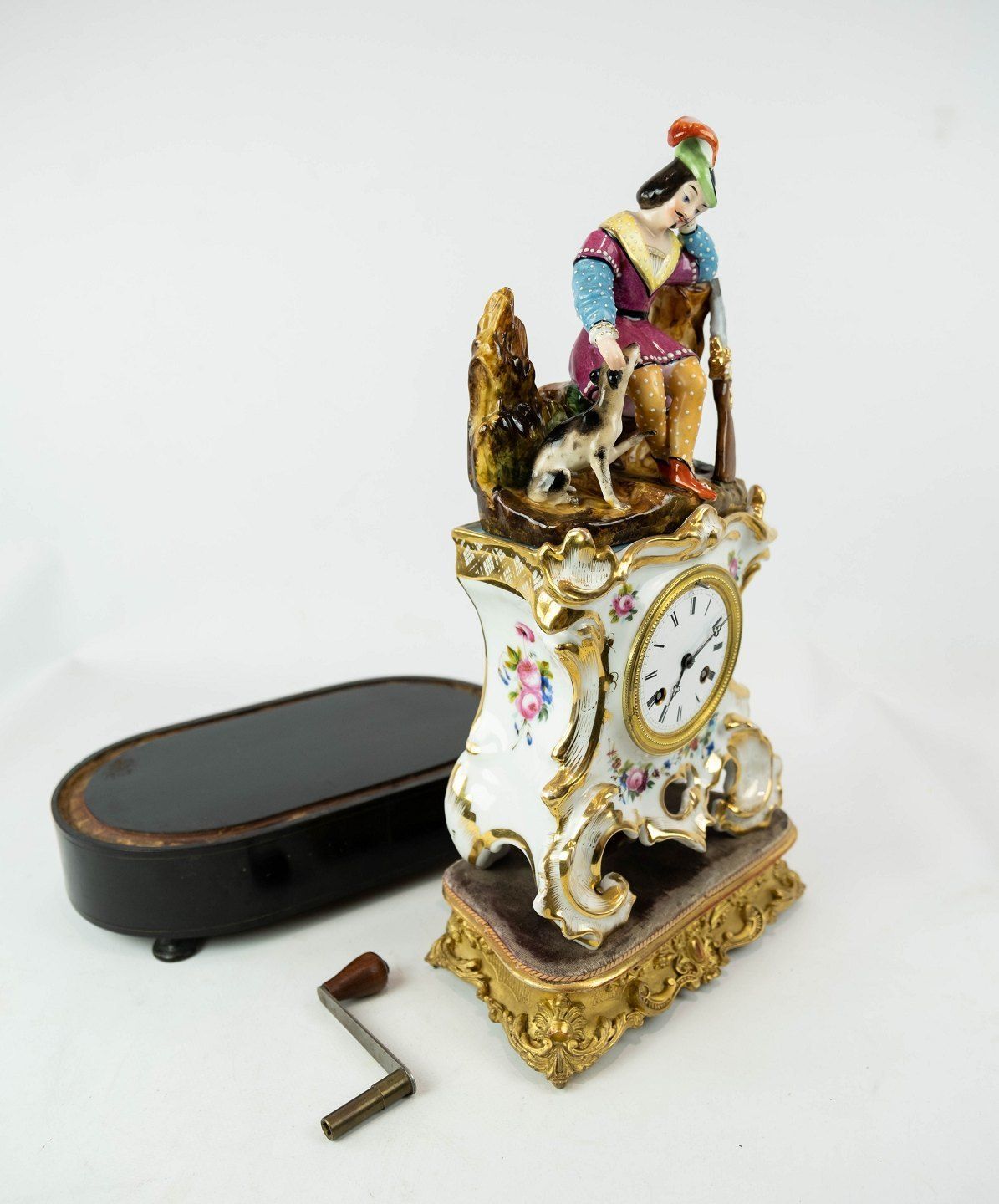 French Table Clock With Glass Dome And Decorated With Porcelain Figurine From 1860. photo for sale