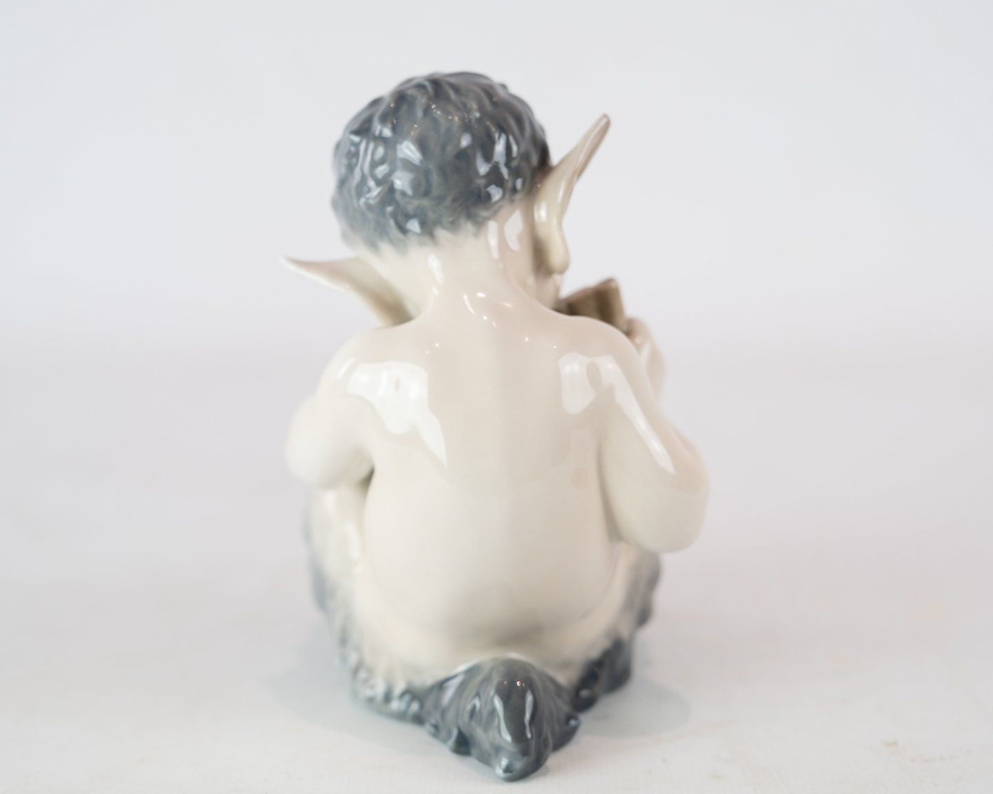 Kgl. Porcelain Pan Figure With Flute, No .: 1736 By Royal Copenhagen. photo for sale