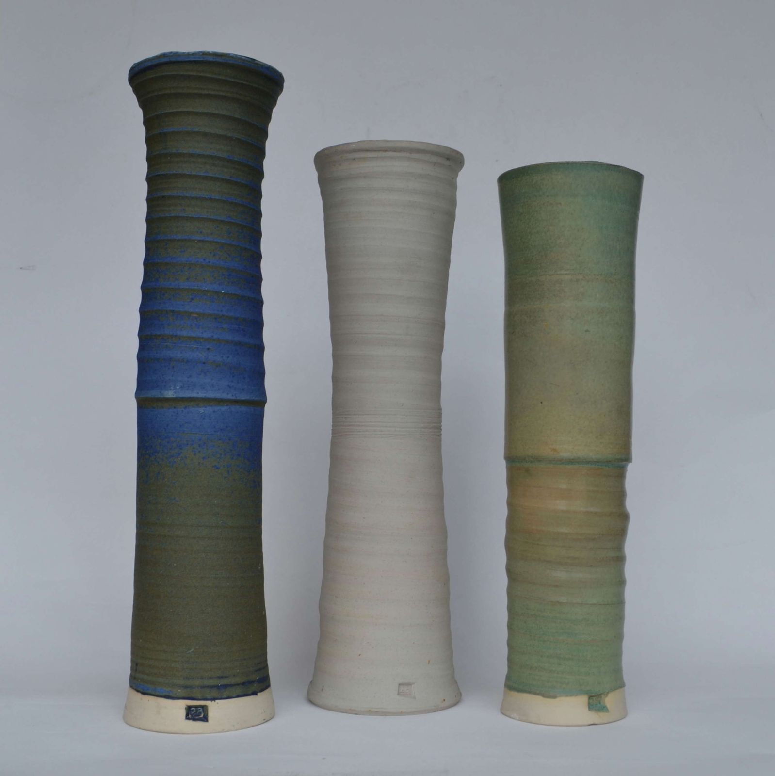 Three Large Studio Pottery Vessels In Blue, Green & Sand photo furniture