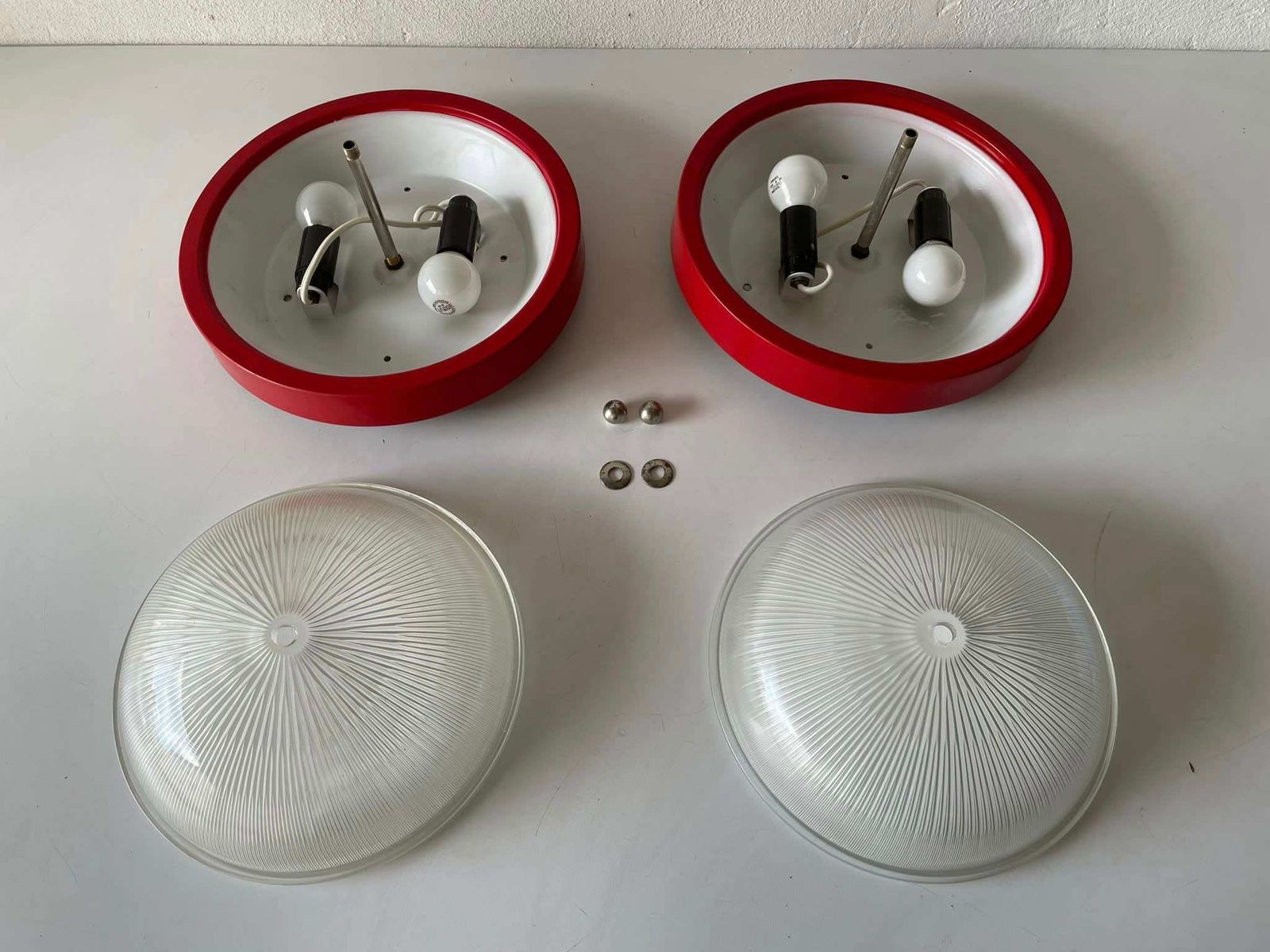 photo furniture Glass And Red Metal Base Pair Of Sconces Or Ceiling Lamps By Reggiani, 1970s, Italy