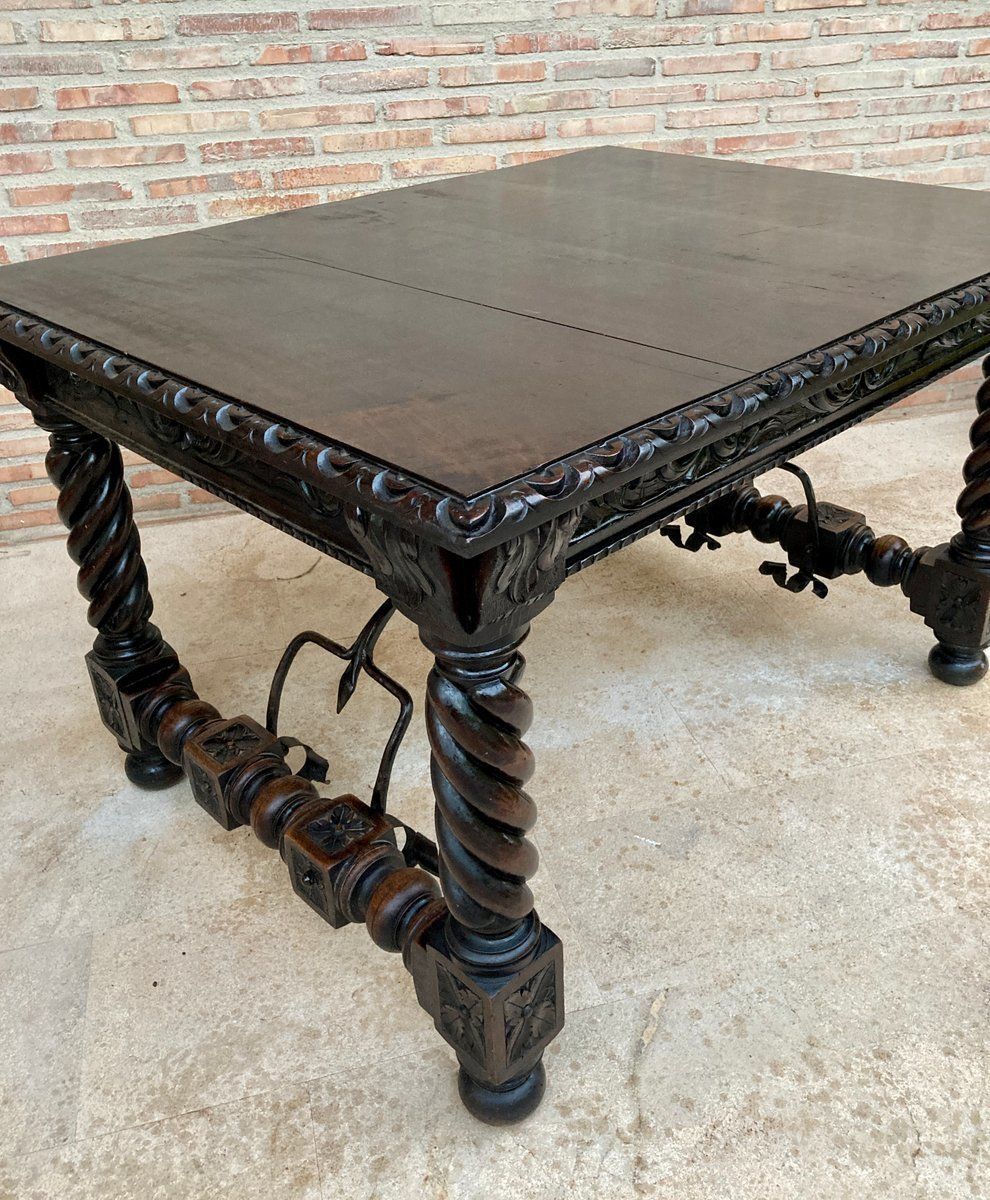 Spanish Baroque Table With Dark Walnut Solomonic Legs With Carved Structure And Iron Stretcher photo vinterior