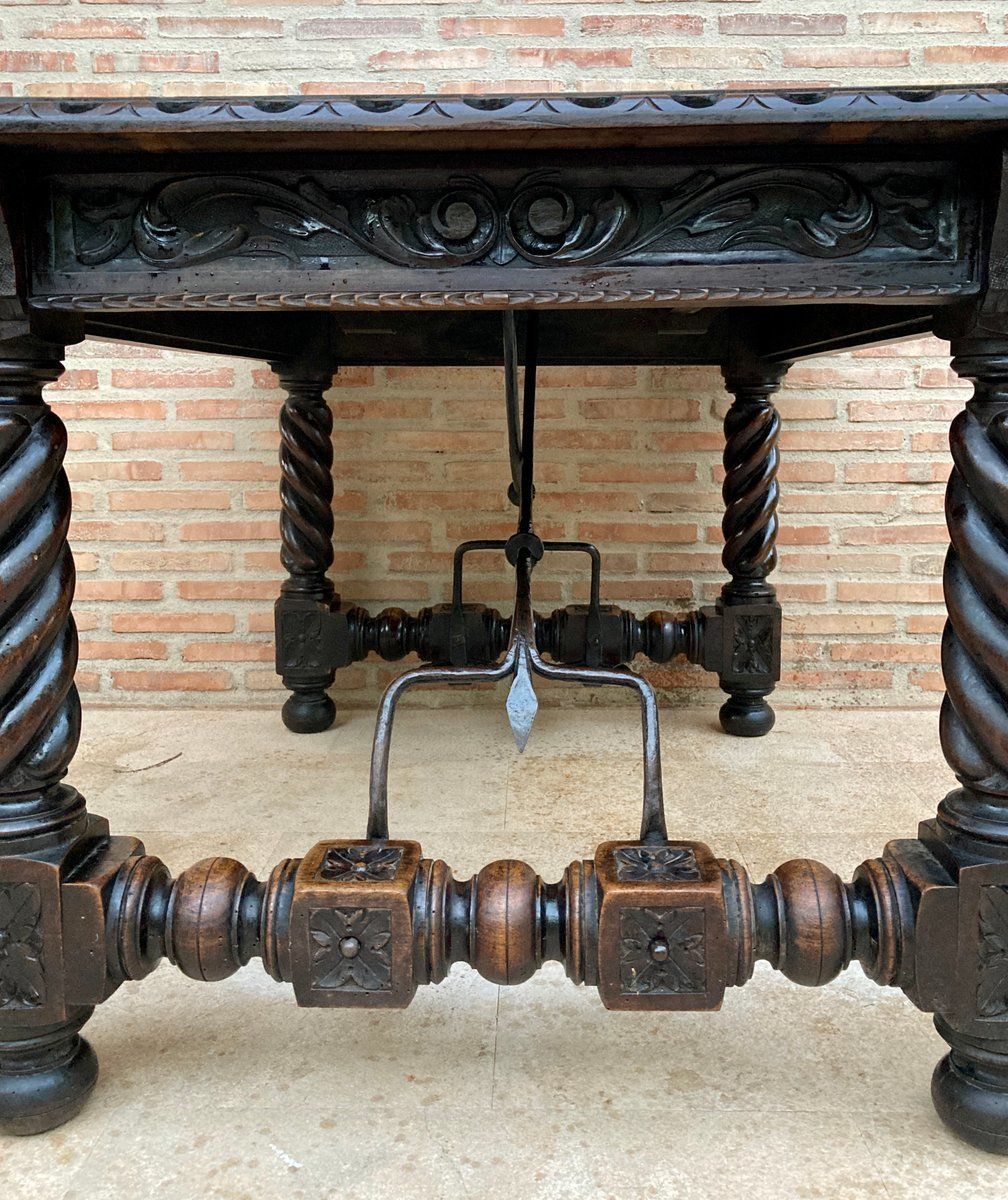 photo for sale Spanish Baroque Table With Dark Walnut Solomonic Legs With Carved Structure And Iron Stretcher