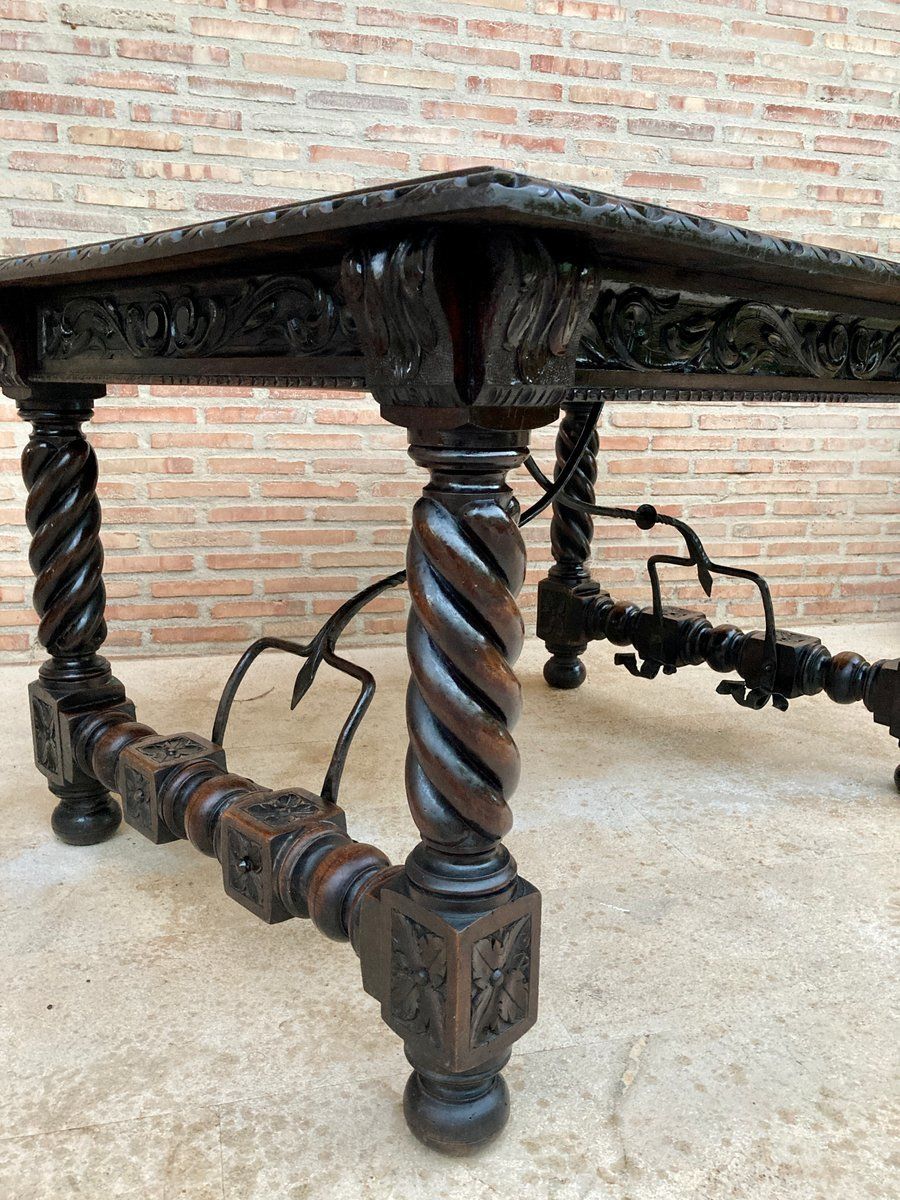 photo vinterior Spanish Baroque Table With Dark Walnut Solomonic Legs With Carved Structure And Iron Stretcher