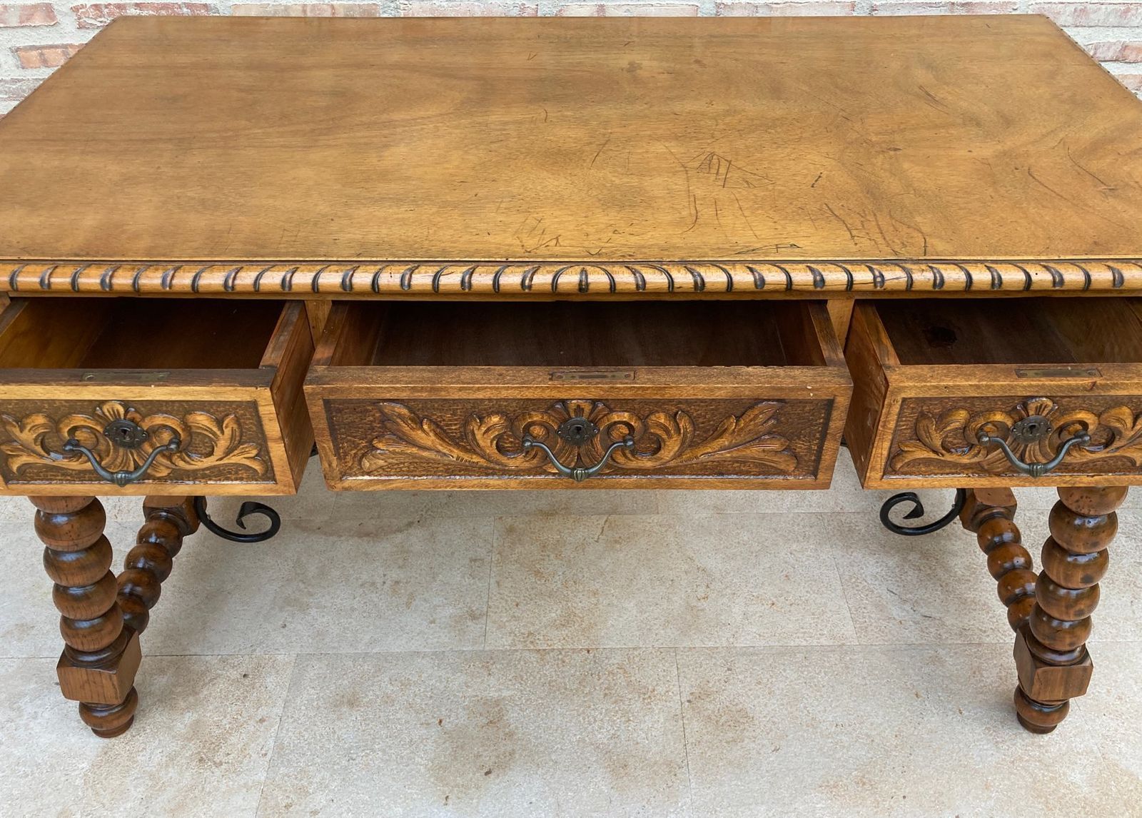 photo for sale 19th Century French Hand Carved Oak Desk With Iron Stretcher & Solomonic Legs