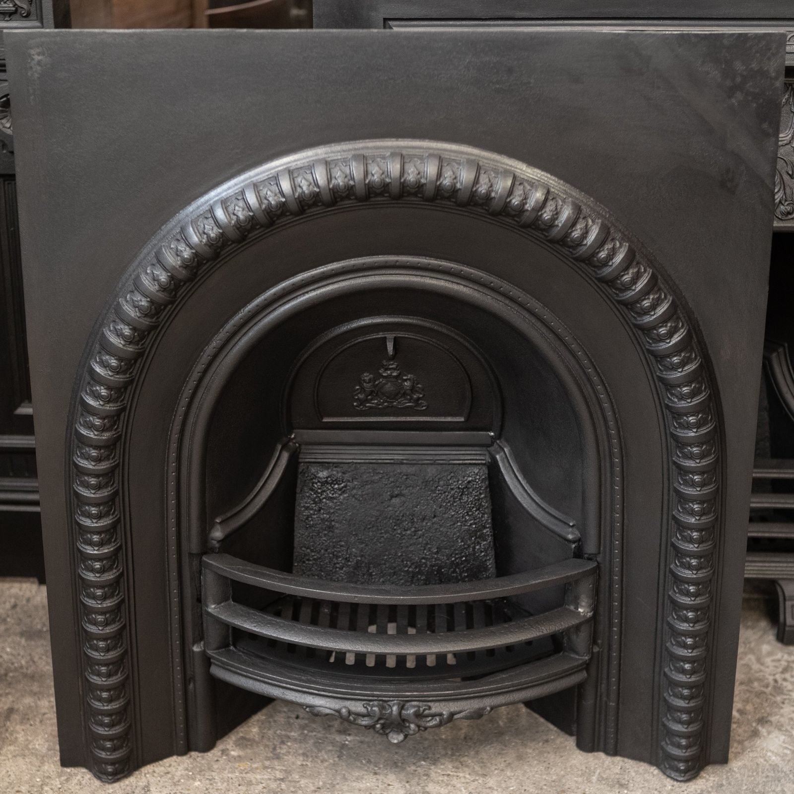 photo furniture Antique Cast Iron Arched Fireplace Insert