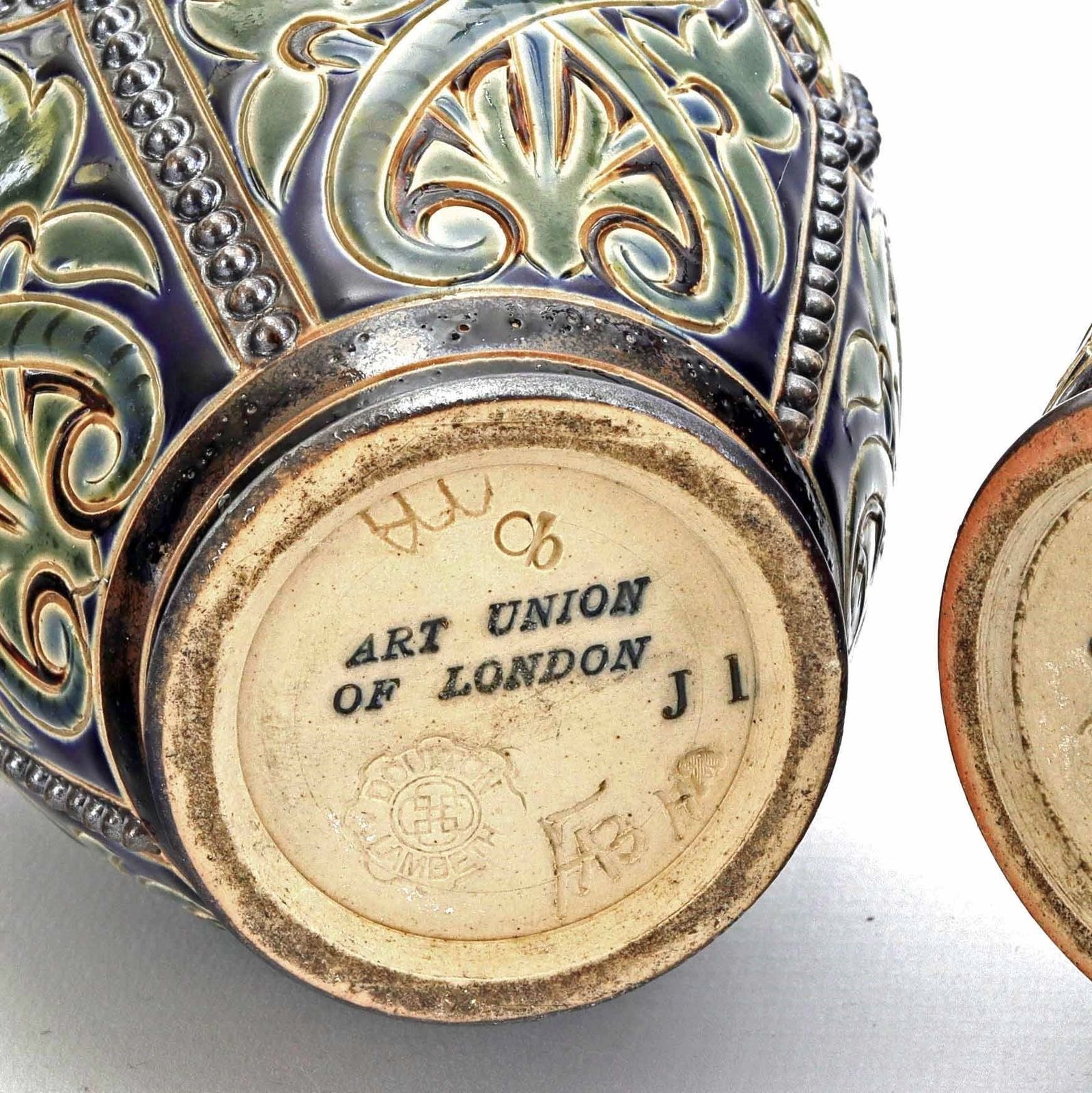 photo furniture Pair Of Doulton Lambeth Bottle Vases With Applied Griffins By Frank Butler C1885
