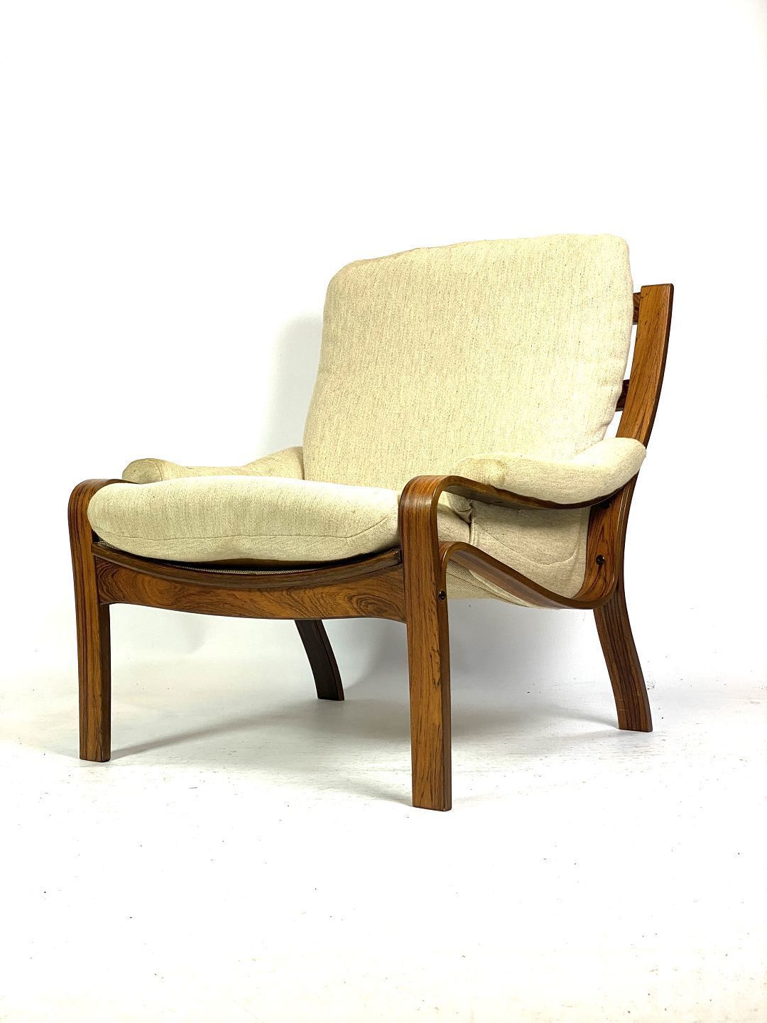 Easy Chair In Rosewood And Upholstered With Light Fabric, Of Danish Design From The 1960s
