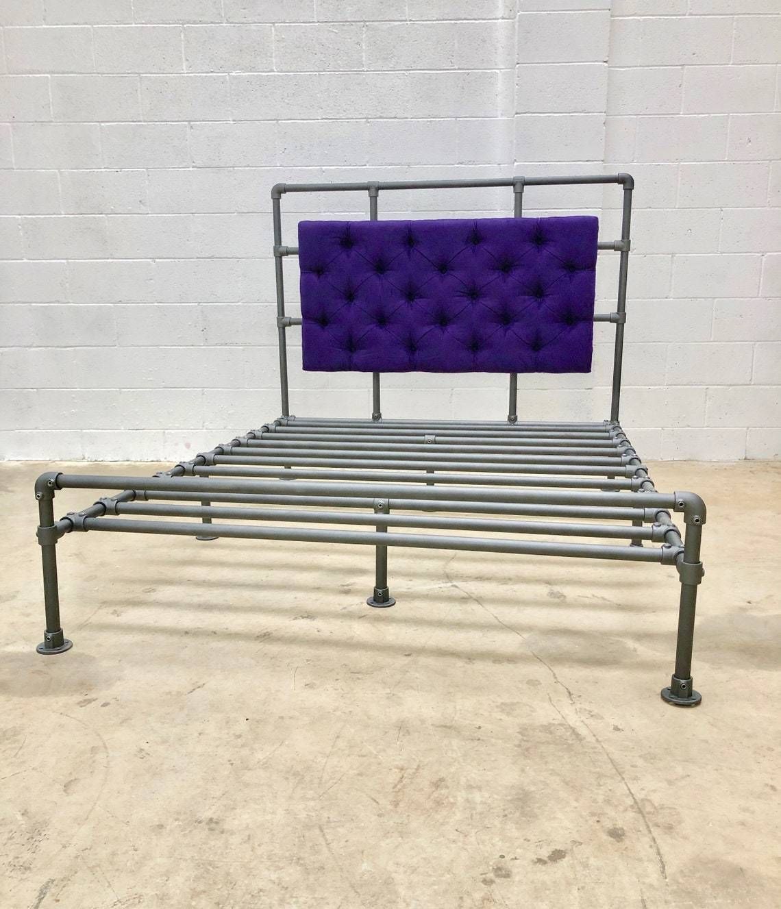 Relugas Industrial Steel Pipe Kingsize Bed Frame With Designers Guild Purple Faux Suede Deep Buttoned Padded And Upholstered Headboard