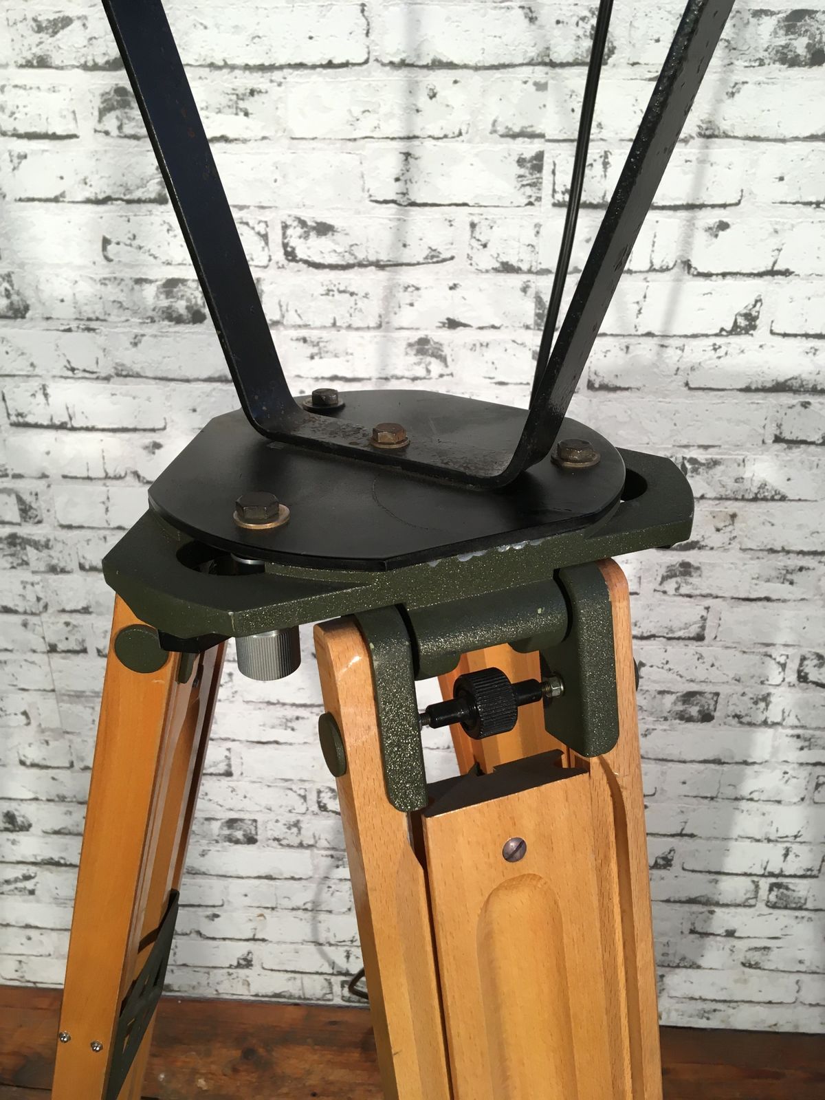 photo furniture Black Vintage Industrial Spotlight On Wooden Tripod 