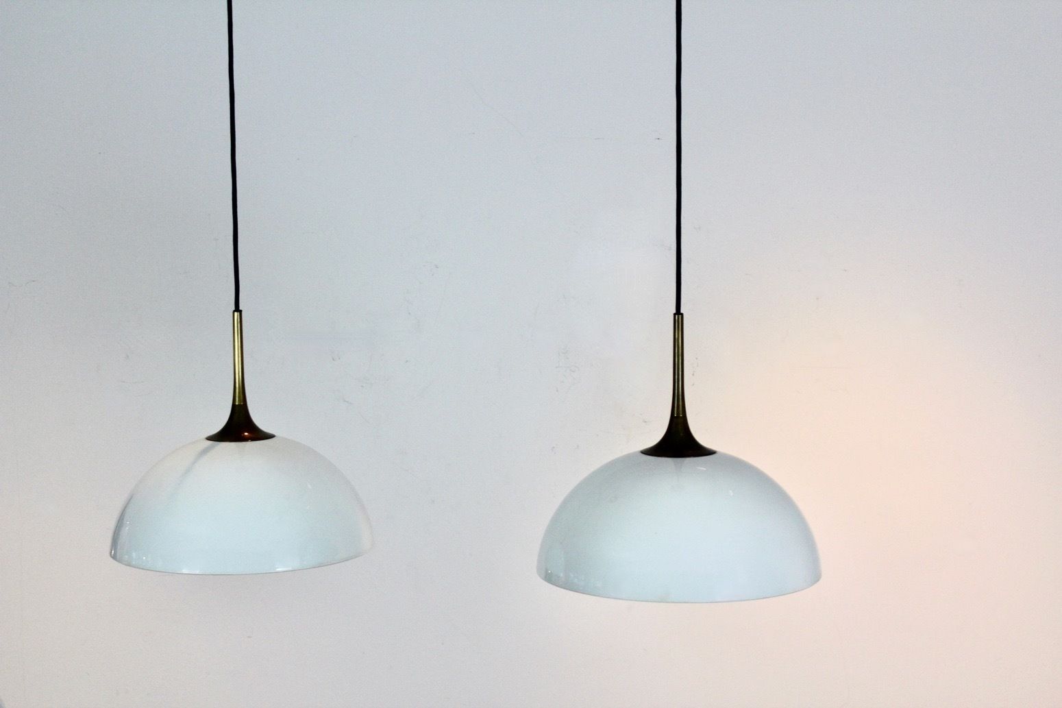 Pair Of Brass And White Opal Glass Pendant Lights By Florian Schulz photo vinterior