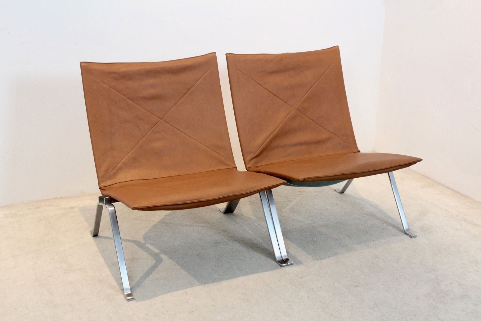 Cognac Leather Pk22 Chairs By Poul Kjærholm For E. Kold Christensen photo furniture