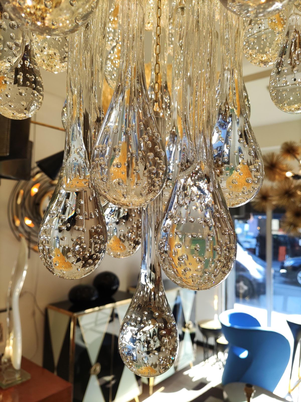 photo furniture Murano Glass Chandelier Golden Brass And Crystal Drops
