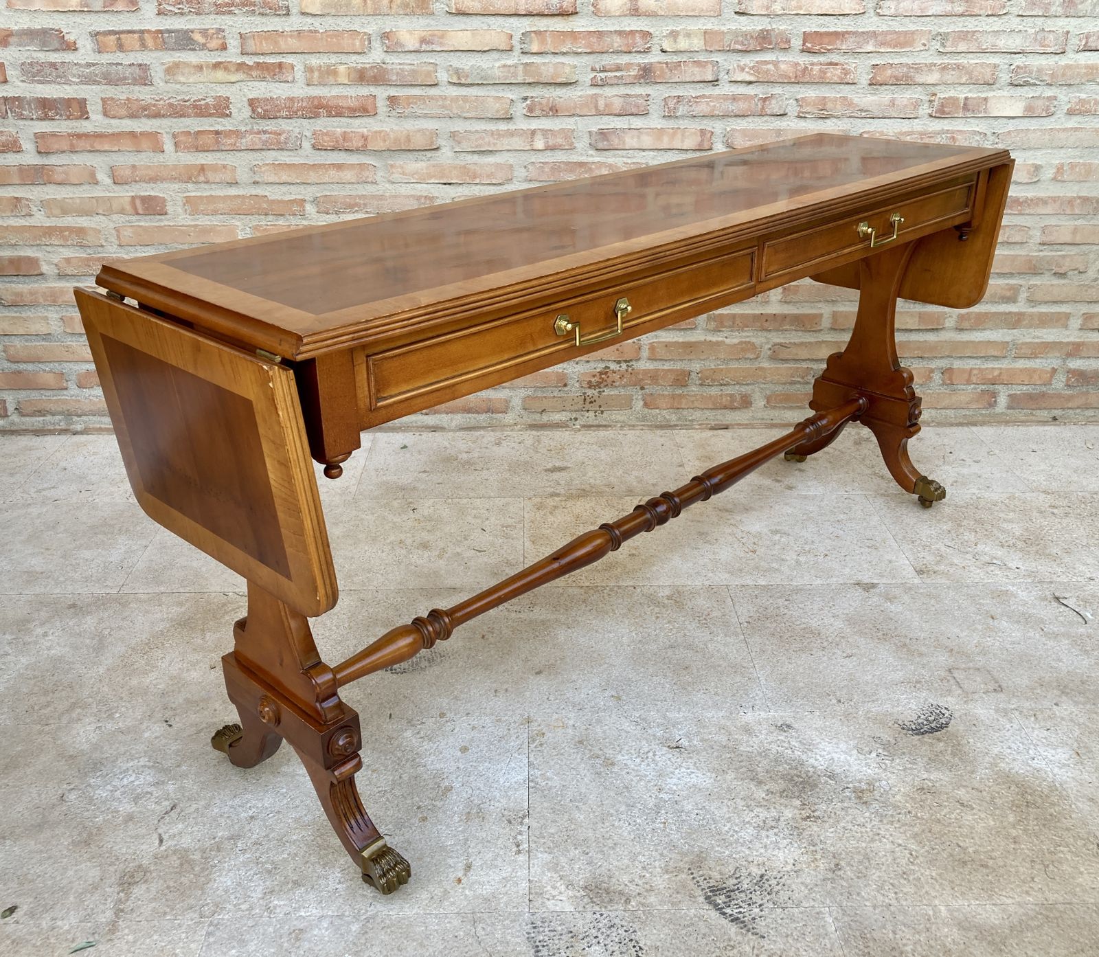Mid 20th Century Winged Console Table In Walnut With Claw Feet In Bronze, Two Drawers And Wheels photo vintage