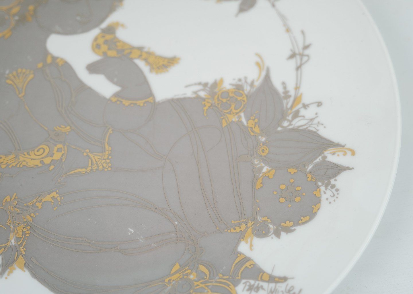Plate With Motif Of Lady In Gold And Gray Colors In Porcelain Designed Bjørn Winnblad And Produced By Rosenthal. photo for sale