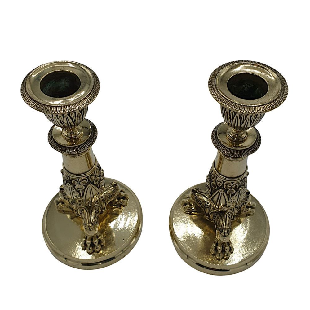 A Beautiful Pair Of 19th Century Empire Style Polished Brass Candlesticks photo for sale