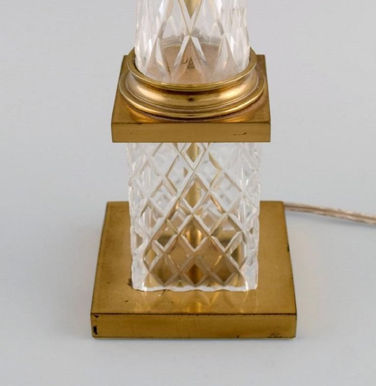 Pair Of Tall And Sleek Table Lamps In Clear Crystal Glass And Brass, France photo Lighting