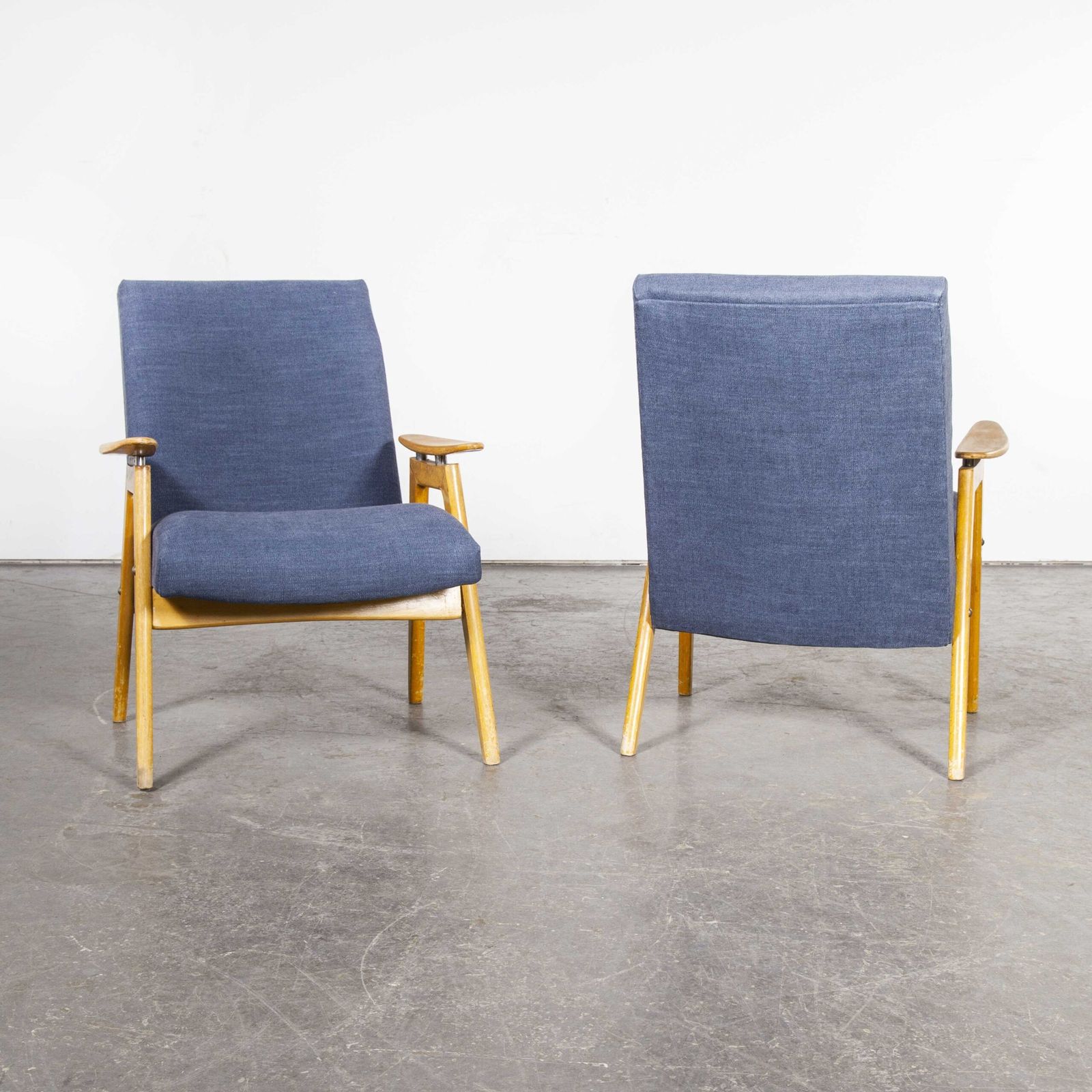 Mid Century Pair Of Upholstered Armchairs With Straight Arms And Top Caps photo for sale
